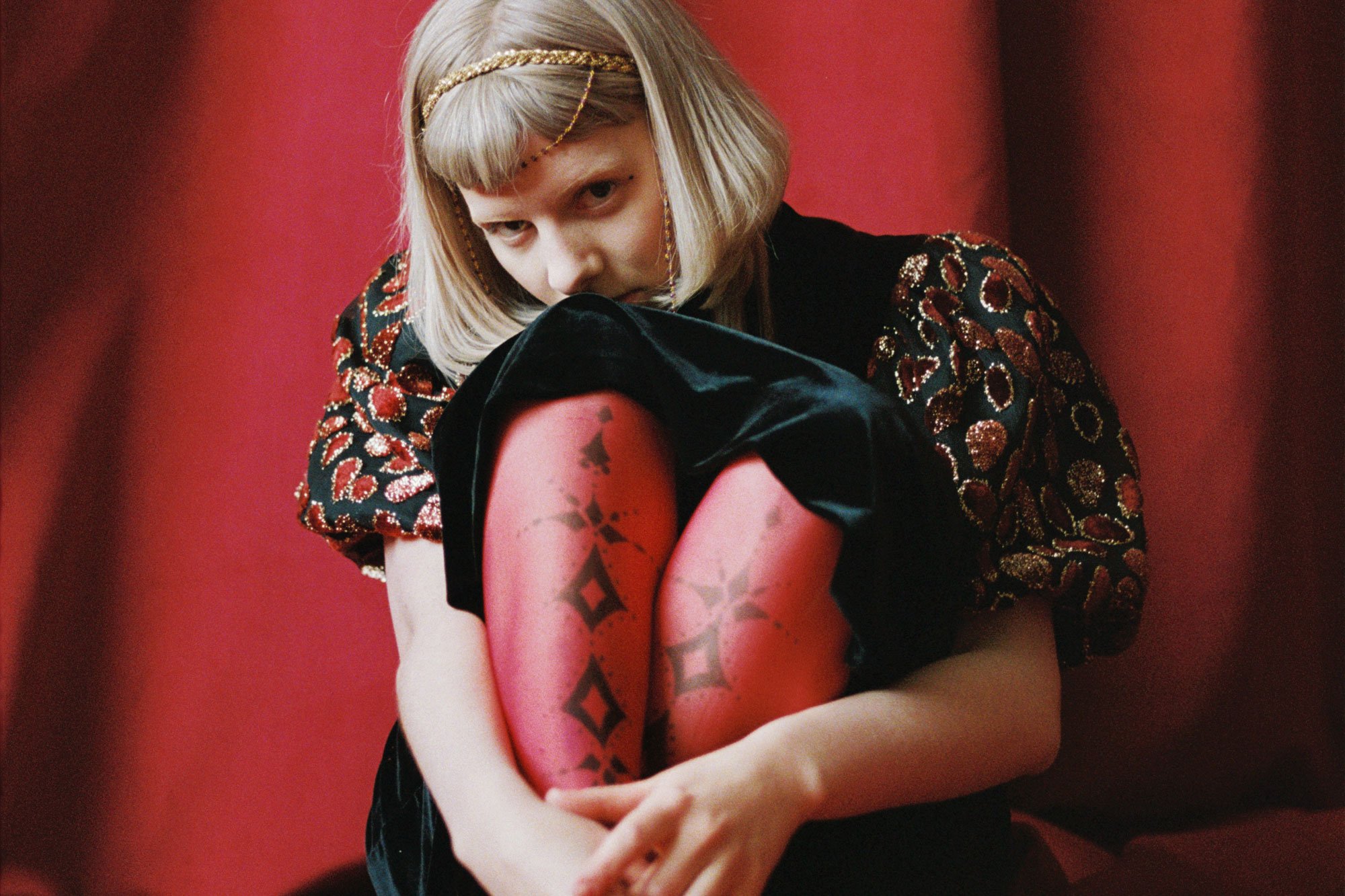 AURORA announces "worldwide digital experience" 'A Touch Of The Divine', debuts new track 'Heathens'