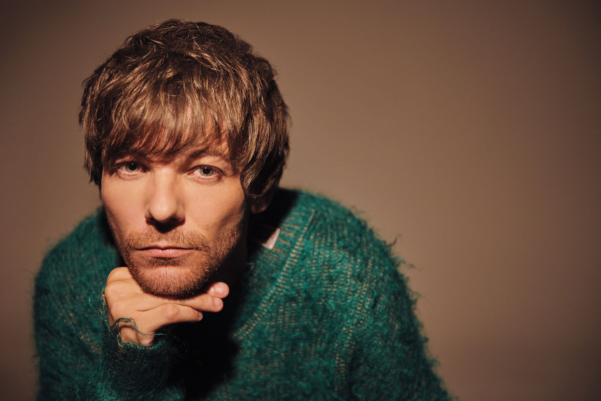 Louis Tomlinson is dropping his next single 'Out Of My System' this Friday