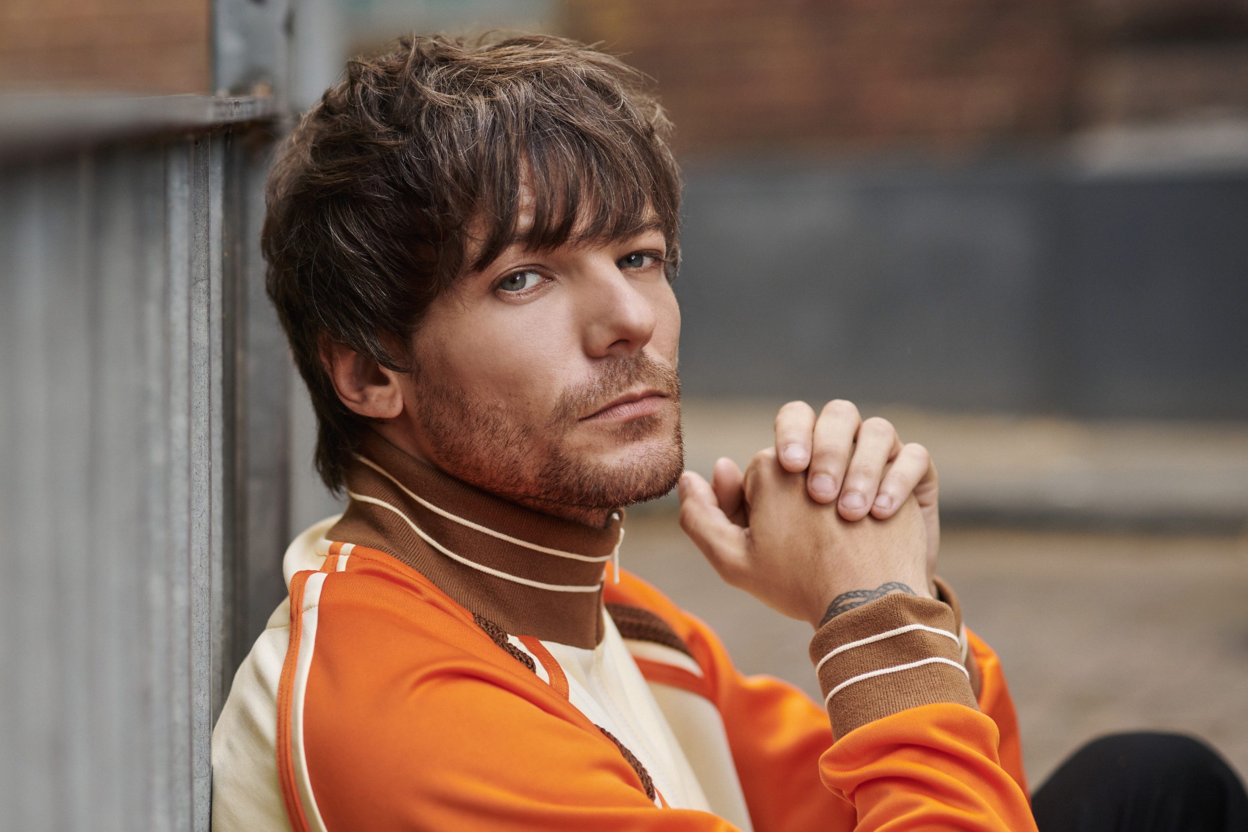 Louis Tomlinson has debuted the video for his new single, 'Out Of My System'