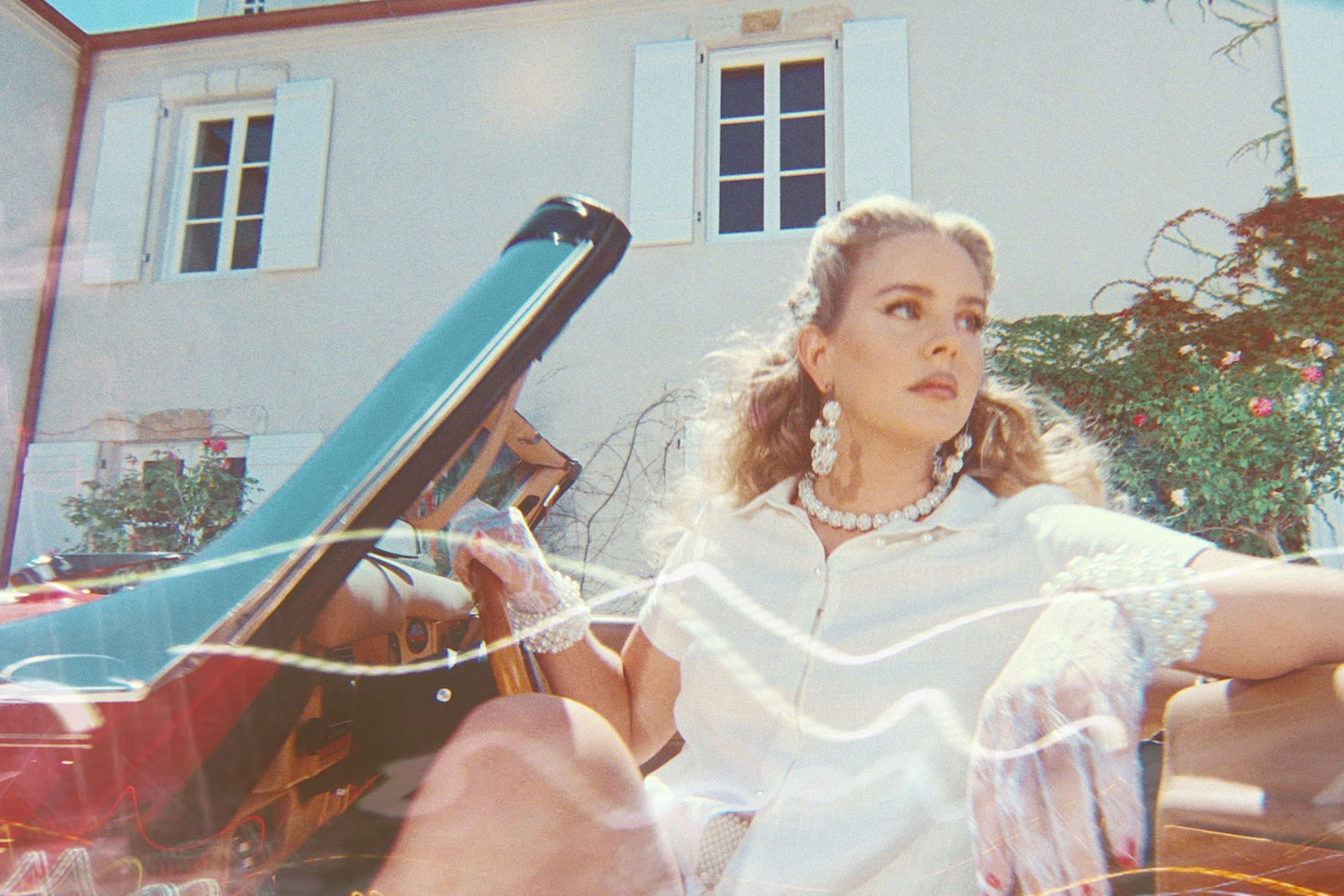 Lana Del Rey has shared three new tracks, 'Blue Banisters', 'Text Book' and 'Wildflower Wildfire'