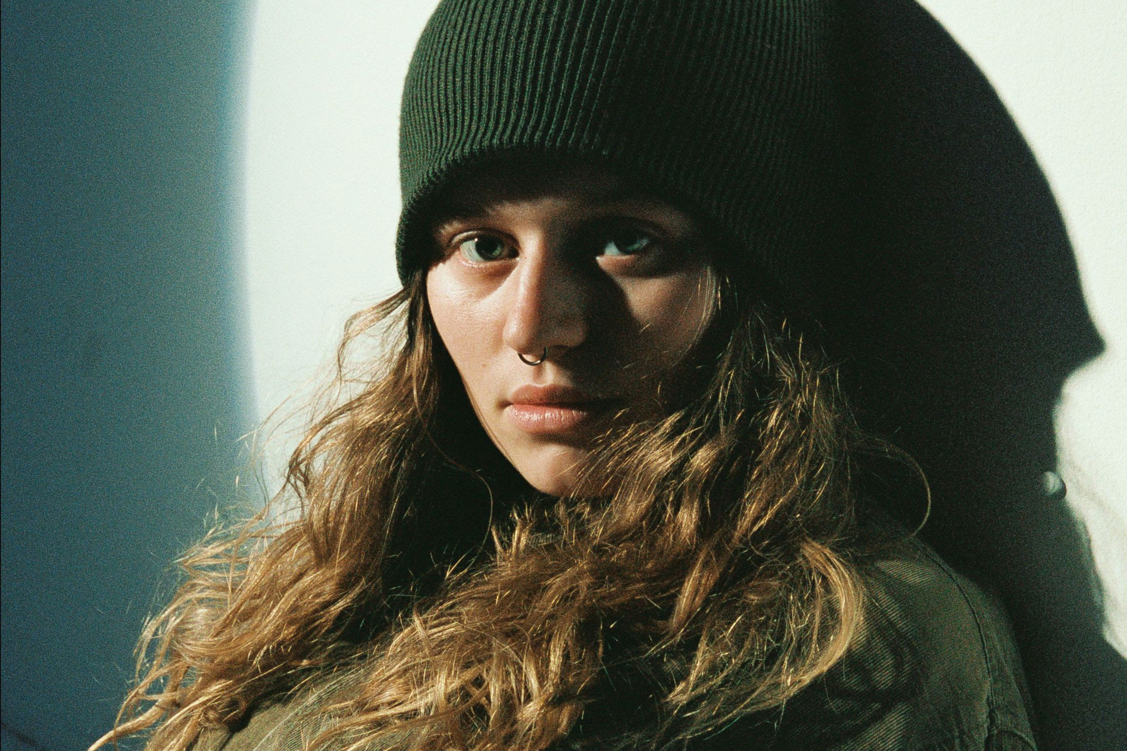 Dork cover star girl in red has announced a headline tour for May 2022