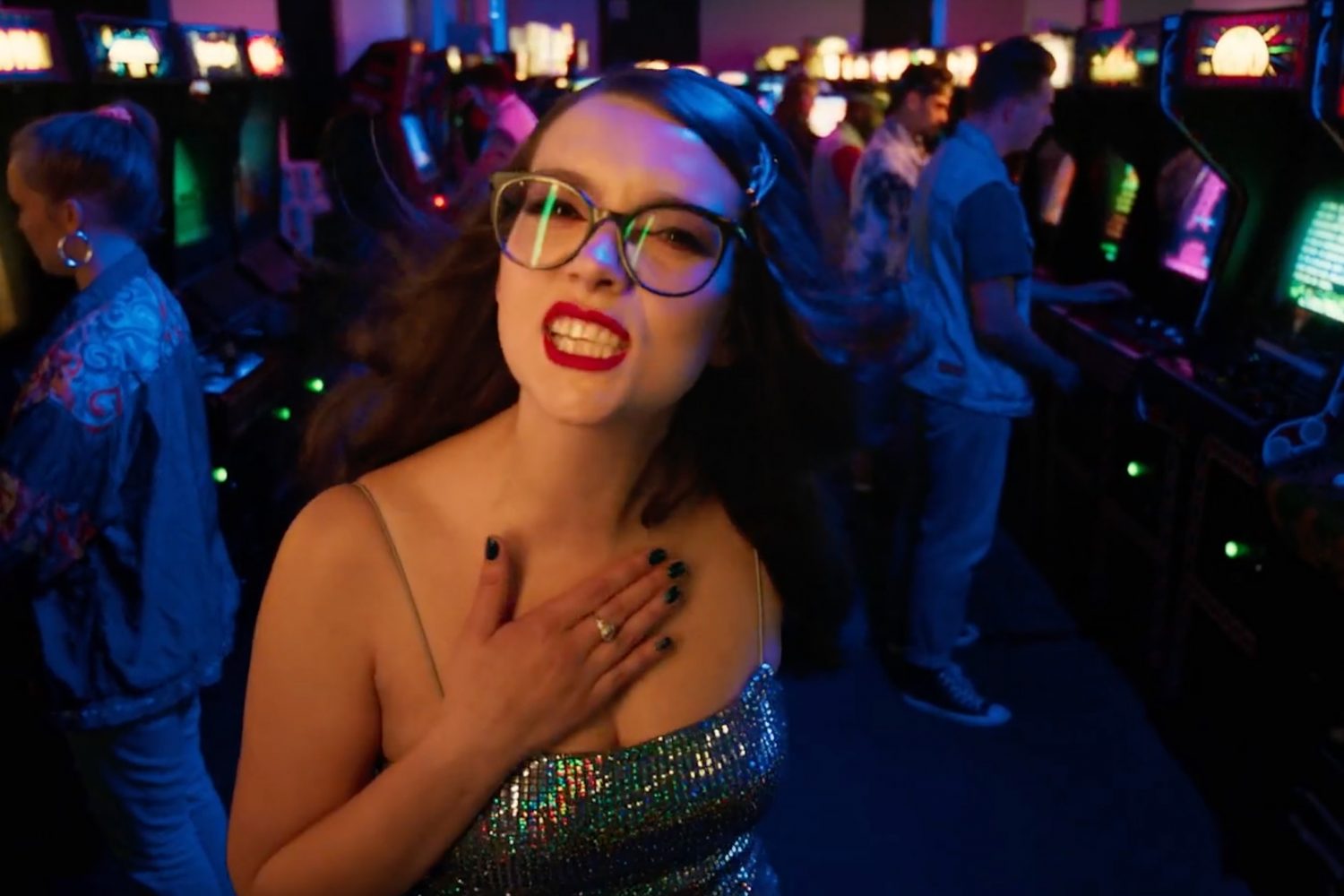 Zuzu takes inspiration from teen movies and vintage arcade games for her new 'What You Want' video