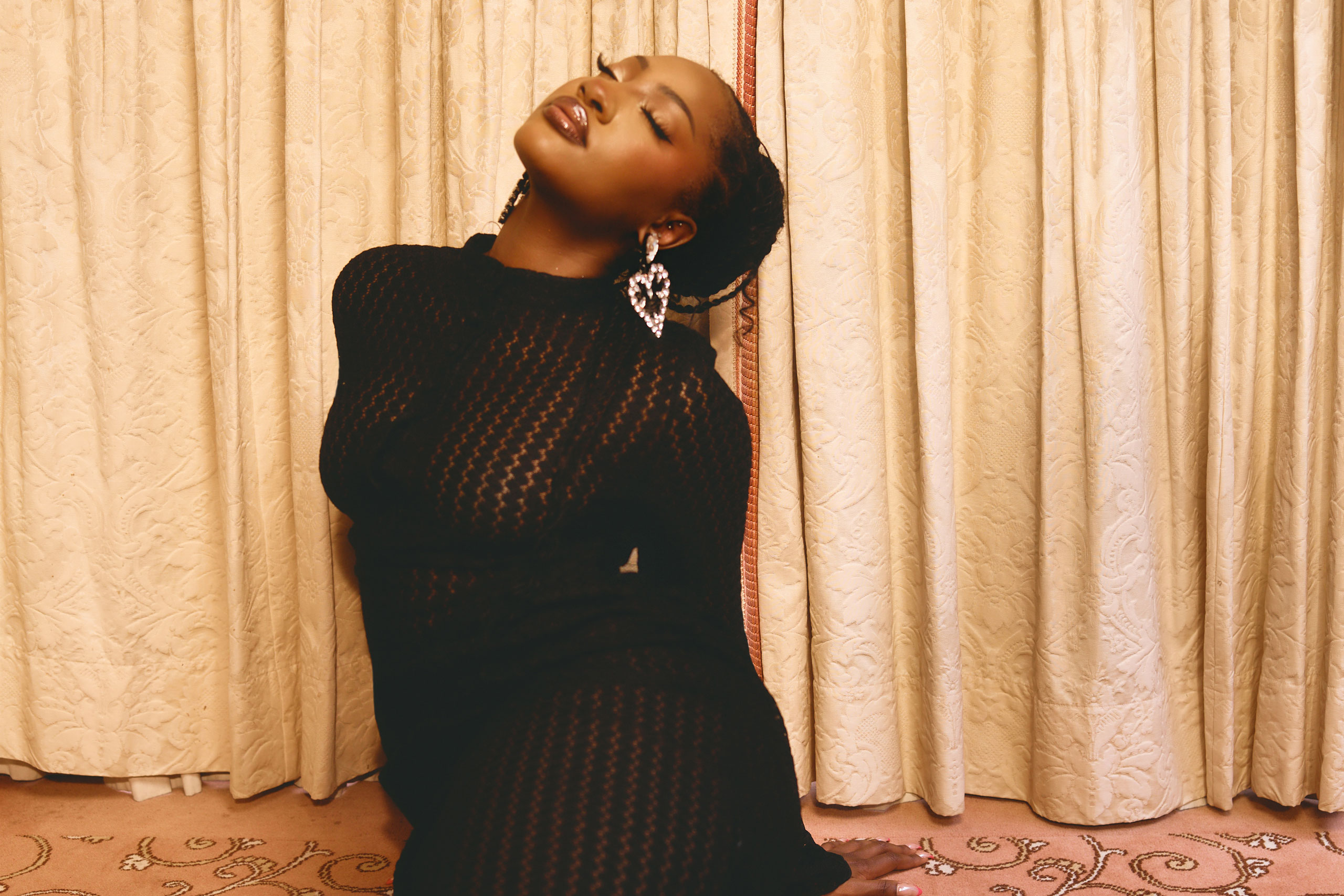 Tems has announced her debut album, 'Born In The Wild'