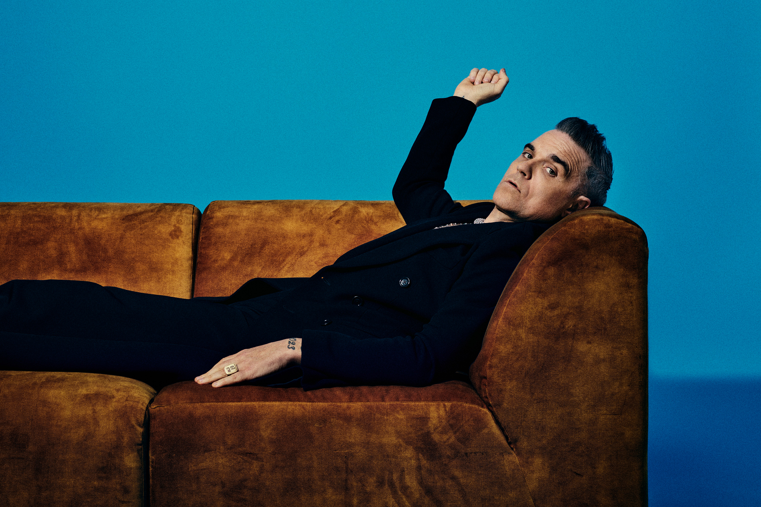 Let me entertain you (as a monkey): Robbie Williams has shared his biopic banger 'Forbidden Road'