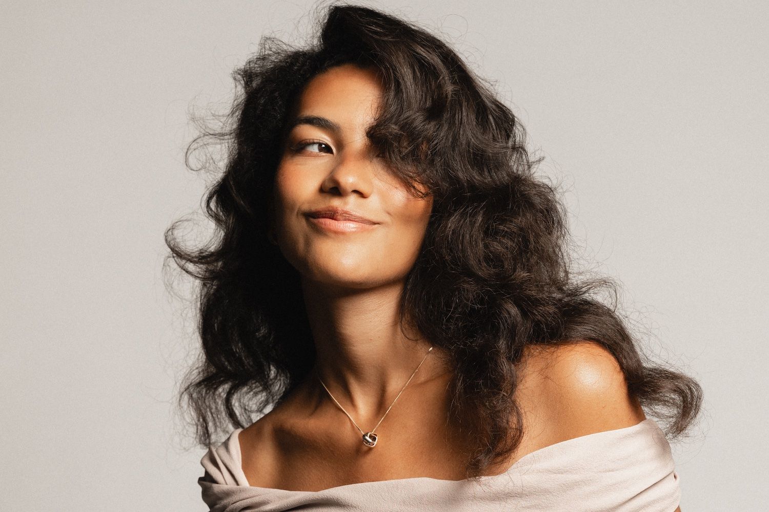 Olivia Dean's 'Man I Need' is now Australia's second-longest running number one single, 'FYI'