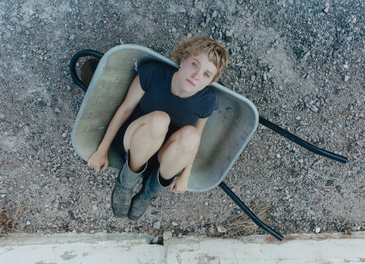 Pem is writing songs in the garden, obviously